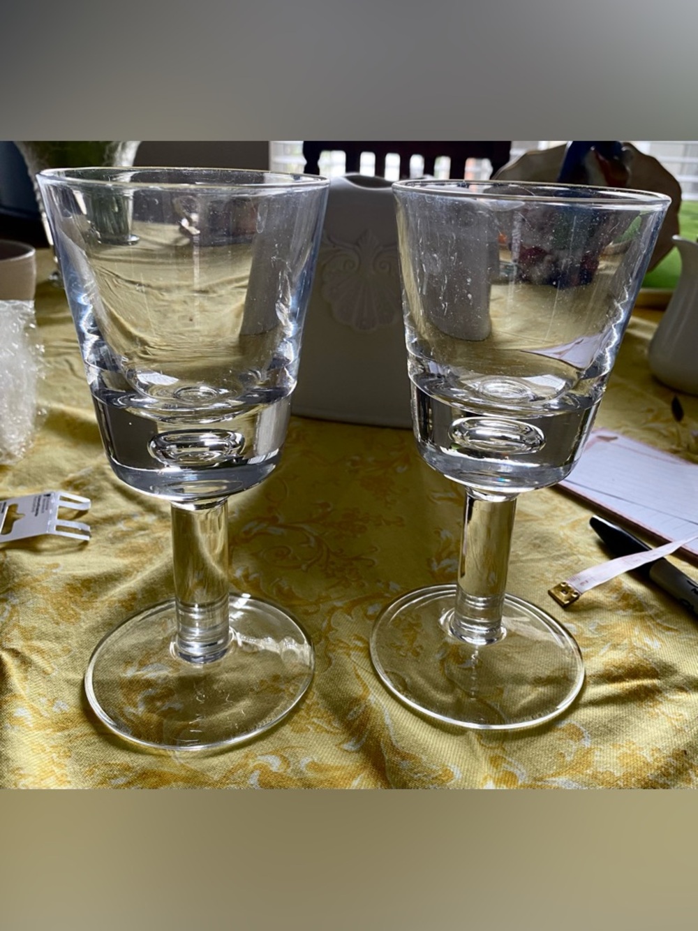 English handblown controlled bubble 7.25 wine glasses. They’re beautiful. Used